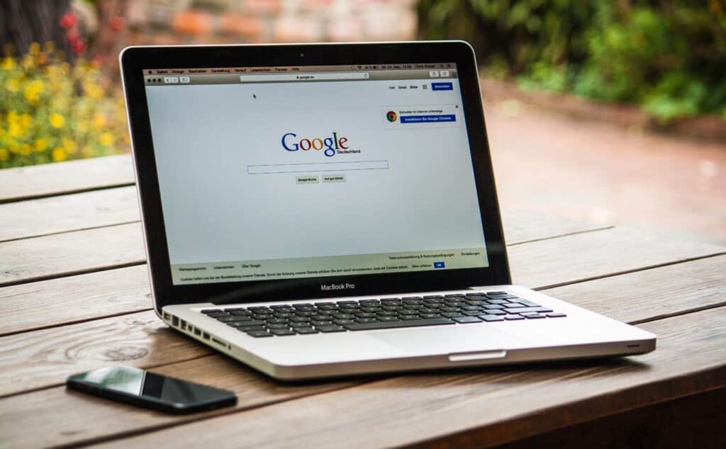 Laptop displaying Google Business Profile for campground reviews outdoors