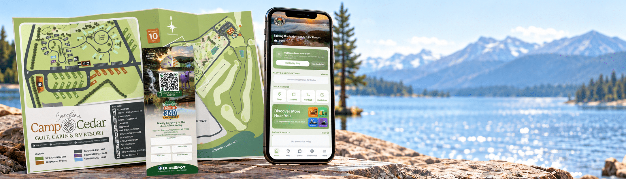 Printed resort maps, hang tag with QR code, and a mobile guest hub beside a mountain lake